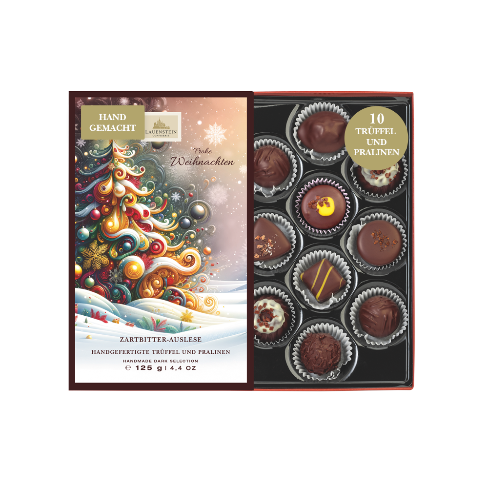 Geöffnete Lauenstein Geschenkpackung mit weihnachtlichem Einschieber und Aufschrift Frohe Weihnachten sowie 10 Zartbitter-Pralinen