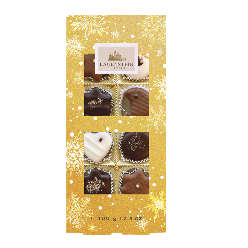 Lauensteiner Pralinenschachtel Weihnachts-Auslese in Gold mit Schneeflocken und acht sichtbaren Pralinen