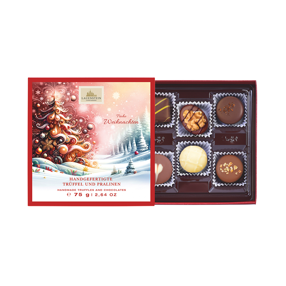 Geöffnete Lauenstein Geschenkpackung mit weihnachtlichem Einschieber und Aufschrift Frohe Weihnachten sowie 6 sortierten Pralinen