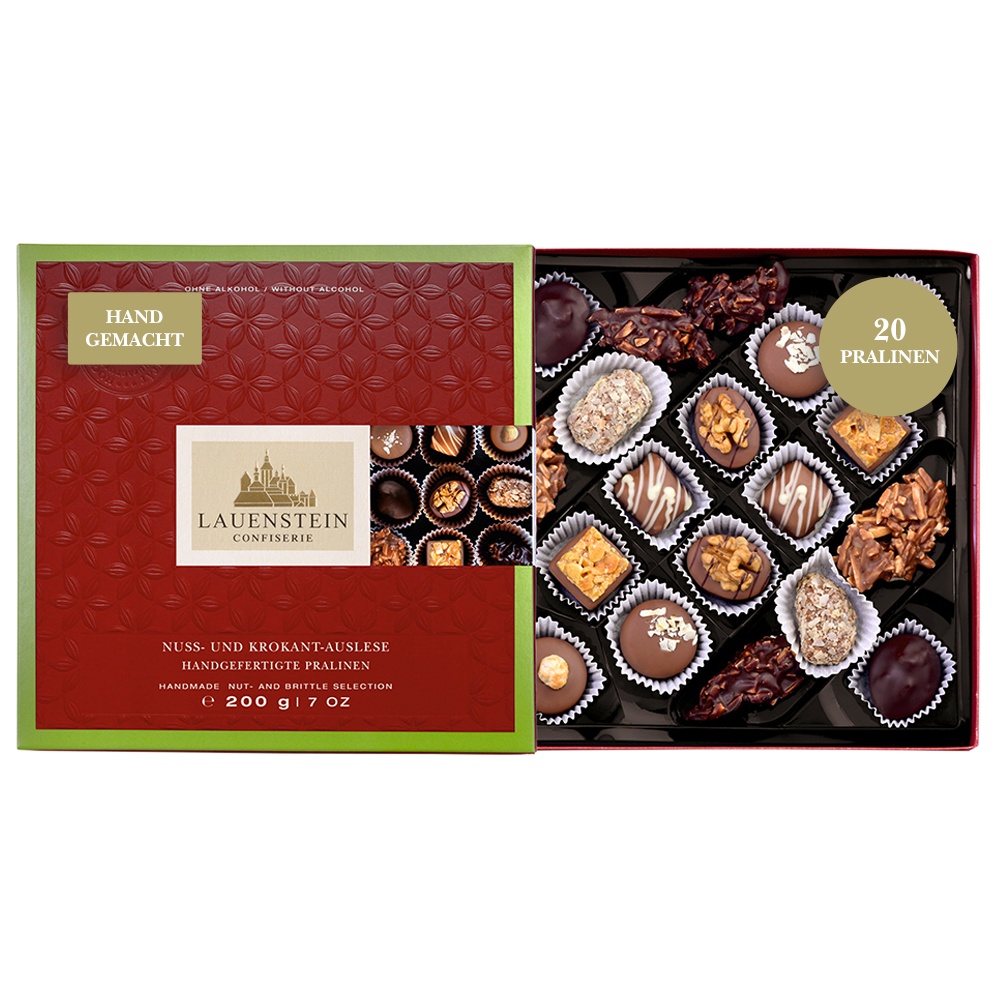 Geöffnete Pralinenschachtel mit 20 handgefertigten Nuss- und Krokantpralinen in Geschenkverpackung