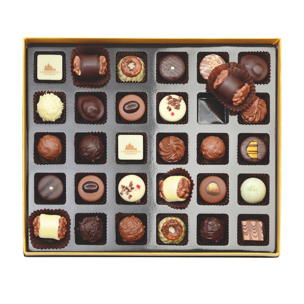 Schwarze Pralineneinlage mit 30 dekorierten Pralinen