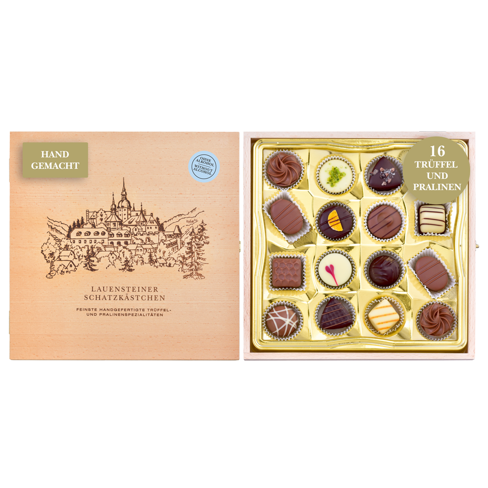Geöffnetes Holzkästchen mit Abbildung der Burg Lauenstein und 16 alkoholfreien handgefertigten Pralinen