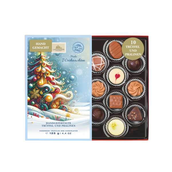 Geöffnete Lauenstein Geschenkpackung mit weihnachtlichem Einschieber und Aufschrift Frohe Weihnachten sowie 10 alkoholfreien Pralinen