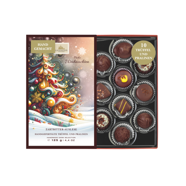 Geöffnete Lauenstein Geschenkpackung mit weihnachtlichem Einschieber und Aufschrift Frohe Weihnachten sowie 10 Zartbitter-Pralinen