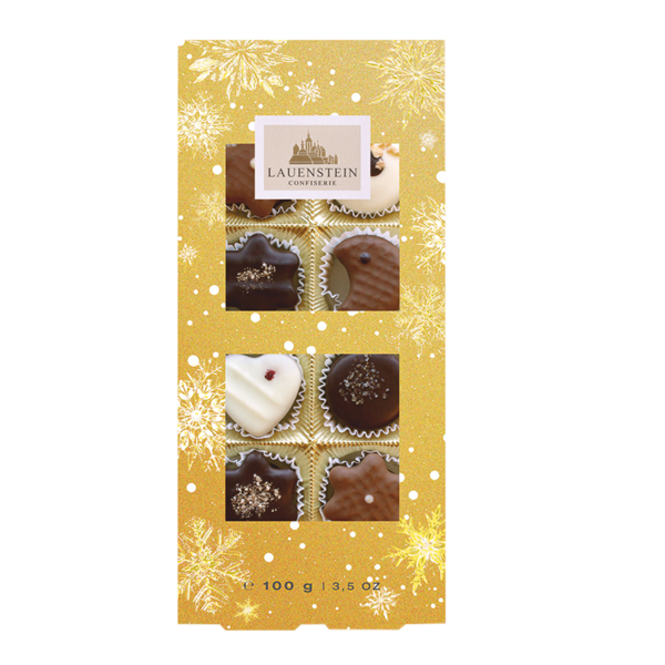 Lauensteiner Pralinenschachtel Weihnachts-Auslese in Gold mit Schneeflocken und acht sichtbaren Pralinen