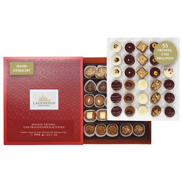 Handgemachte Lauensteiner Trüffel und Pralinen in geöffneter roter Geschenkbox mit 55 Pralinen auf zwei Lagen