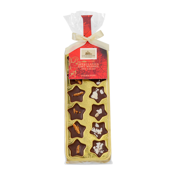 Sternförmige Schokoladen-Nips von Lauenstein mit Spekulatius und Zimt-Mandel (38% Kakao) in goldener Geschenkverpackung mit Schleife