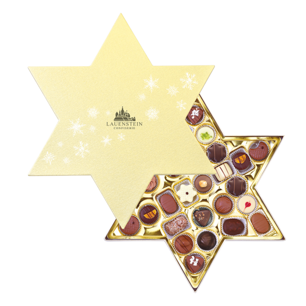 Geöffnete sternförmige Lauensteiner Pralinenmischung mit goldenem Deckel und silbernen Schneeflocken mit alkoholfreien Pralinen
