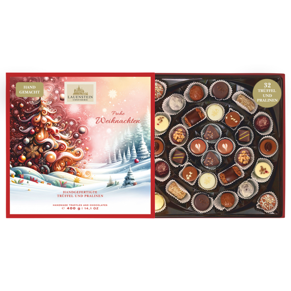 Geöffnete Lauenstein Geschenkpackung mit weihnachtlichem Einschieber und Aufschrift Frohe Weihnachten, sowie 32 sortierten Pralinen