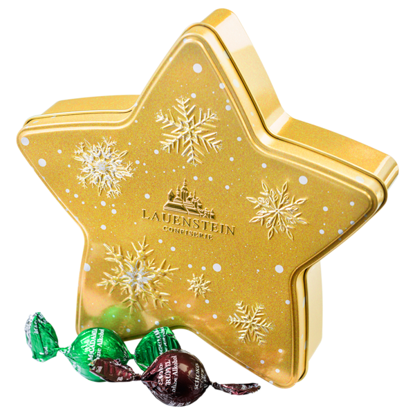 Aufrecht stehende goldene Metalldose in Sternform mit weißen Schneeflocken-Motiven und Lauenstein-Logo neben zwei einzeln gewickelten Gourmetkugeln