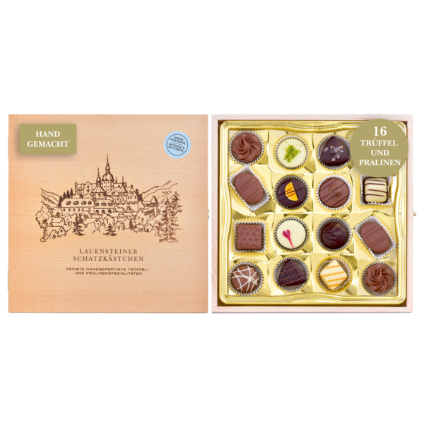 Geöffnetes Holzkästchen mit Abbildung der Burg Lauenstein und 16 alkoholfreien handgefertigten Pralinen